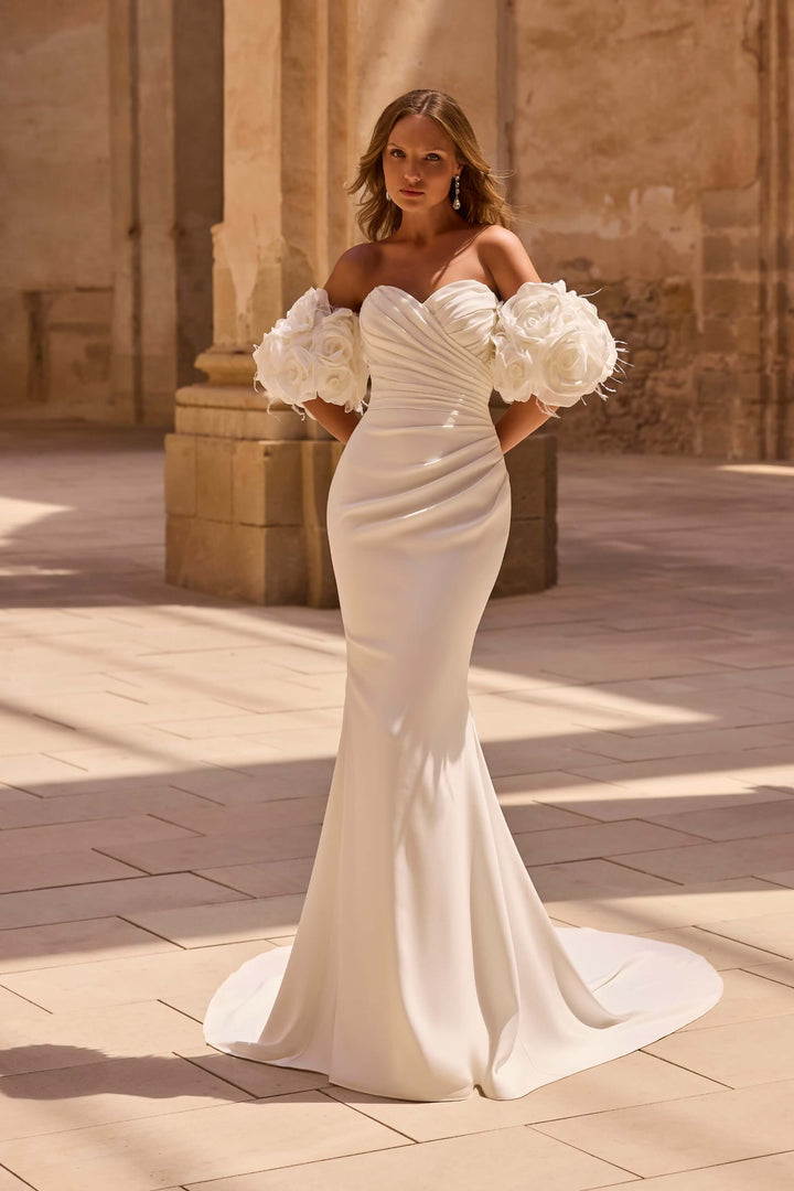 Elegant Fit &amp; Flare wedding dress with a defined waist and timeless design
